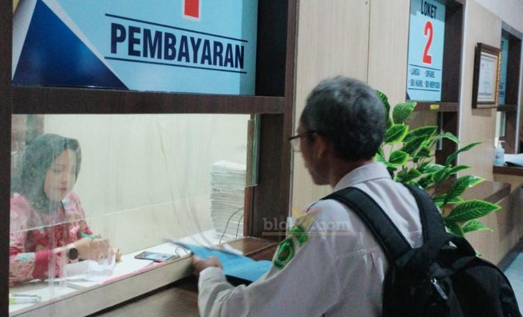 Loket registasi pembuatan sim di Satlantas Polres Gresik.(blok-a.com/ivan)