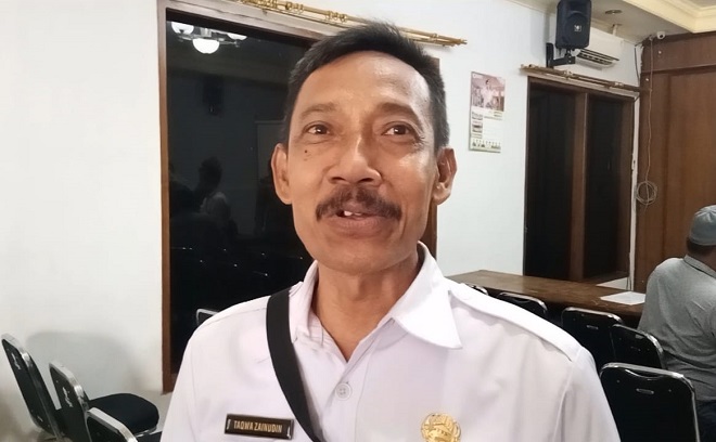 Taqwa Zainudin Kades Roomo diperiksa Bidang Pidsus Kejari Gresik buntut dugaan beras CSR tak layak konsumsi.
