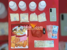 Barang bukti pil koplo dan sejumlah uang berhasil diamankan polisi.(blok-a.com/Syahrul Wijaya)